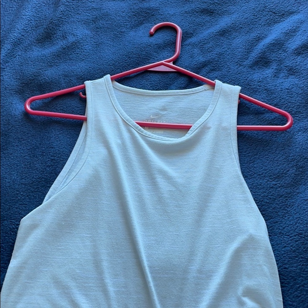 White Nike tank top.